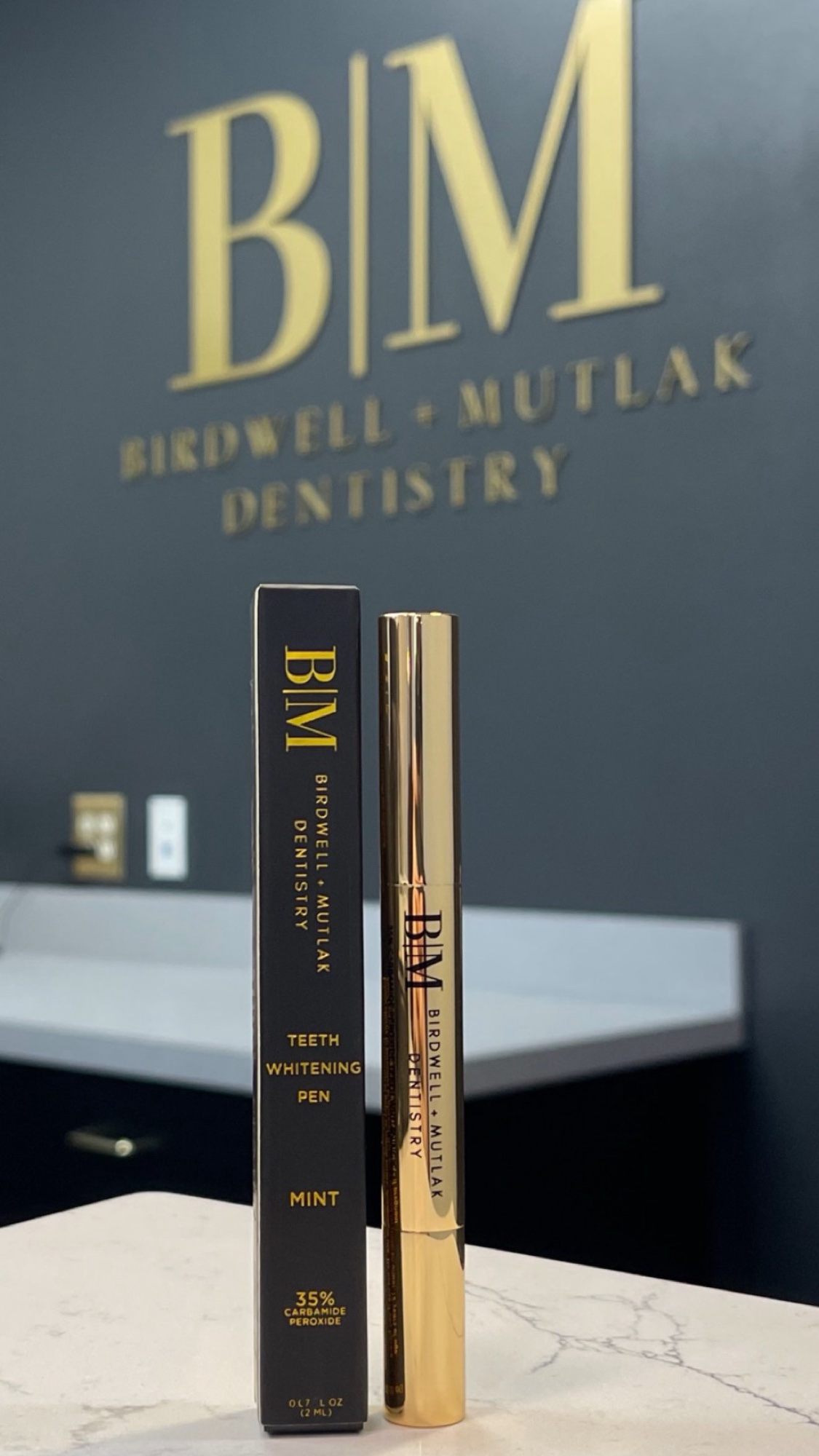 Birdwell & Mutlak branded teeth-whitening pen and box